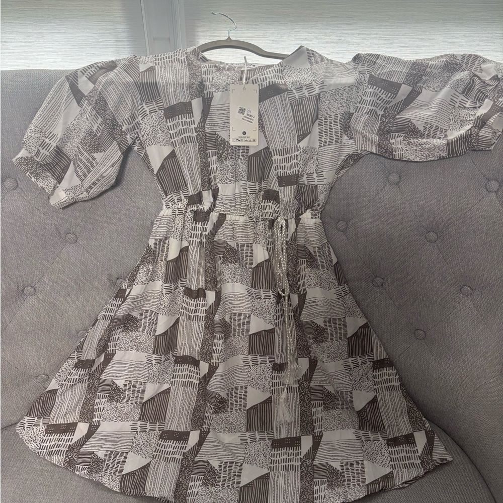 Elegant Black and White Patterned Dress